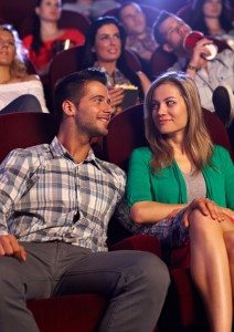 Young couple dating at cinema