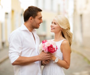 couple with flowers in the city