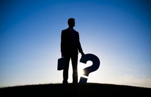 silhouette of Businessman Holding Question Mark