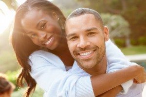 Portrait Of Loving African American Couple In Countryside