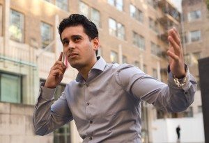 young business man hearing bad news on the phone