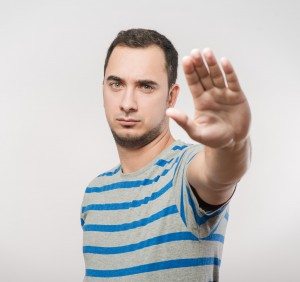 Man showing stop gesture