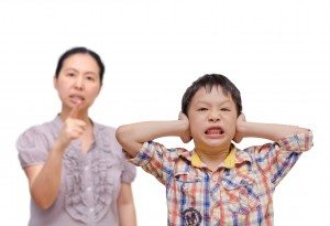 Young Asian Boy Being Scolded by his mother