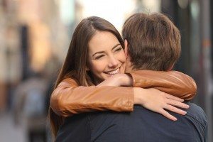 Couple hugging in the street