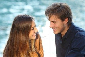 Couple looking each other in love on vacations