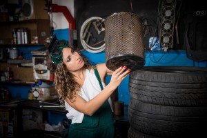 Female mechanic at work. auto service station