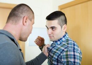 men having fight at home