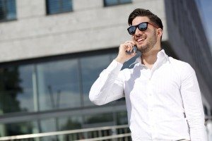businessman talking to mobile
