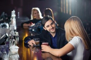 Couple has a drink in bar