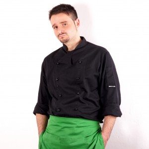 Studio shot of a young man with chef clothes