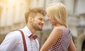 Young funny pretty fashion vintage hipster couple having fun out