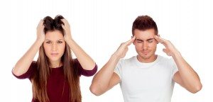 Young girl and boy with headache