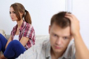 Portrait of unhappy young couple having problems