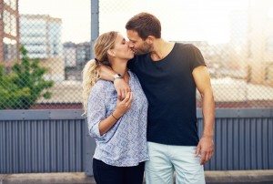 Loving demonstrative man kissing his girlfriend
